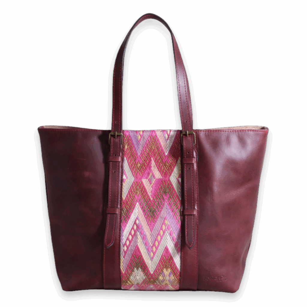 IKAL, a handcrafted leather shoulder bag, with a huipil