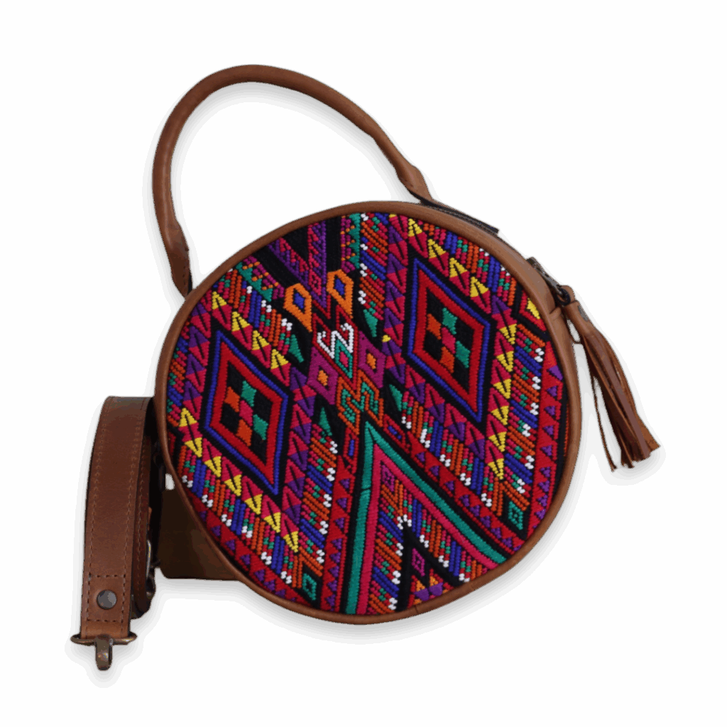 YALIT, a handmade leather shoulder bag, with huipil